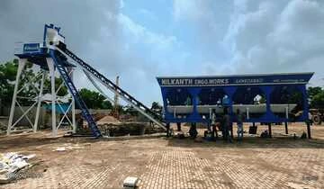 A compact Nilkanth NE-30-SP stationary concrete batching plant, representing an highly efficient and cost-effective small RMC plant setup in Ahmedabad, Gujarat.