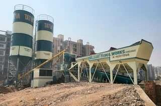 A compact Nilkanth NE-30-SP stationary concrete batching plant, representing an highly efficient and cost-effective small RMC plant setup in Ahmedabad, Gujarat.